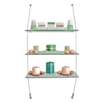 Wall shelving - glass shelves supported by tensioned wires